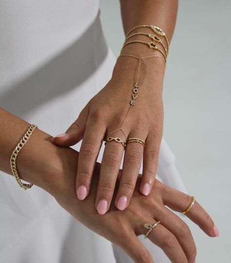 NEW 14K Yellow Gold Hand Chain, ‘Falling in Love’ - Our NEW 14K Chain Ring ‘Diora’ - Our NEW 18K Diamond Ring ‘Verona’ - Our NEW diamond evil eye, star & hamsa tennis bracelets

#statementjewelry #classy #demure #mindful #cleangirl #neshi #neshijewelry #goldjewelry #handchains #goldhandchain #diamonds #fallbracelets #falljewlery #giftideas #fallrings #goldrings #diamondring #chunkygoldjewelry #fallnecklaces #goldbracelets #statementbracelets #gold  #finejewelry #rosegold #diamondrings #chunkyearrings #goldearrings