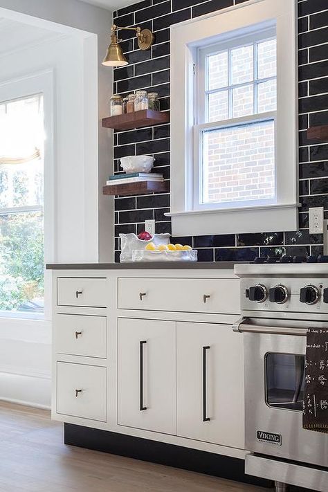 Glossy Black Kitchen Backsplash Tiles That Go All The Way Up To The Ceiling Black Tiles Kitchen, Black And White Backsplash, Kitchen Cabinets Knobs And Pulls, White Grout, Black Backsplash, White Kitchen Backsplash, Kitchen Black, Amazing Kitchen, Kitchen Cabinet Pulls