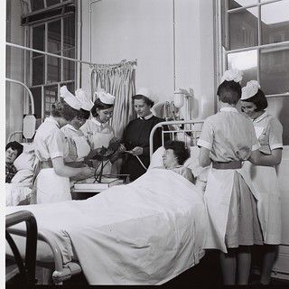 Bedside teaching | This and other pictures in the series are… | Flickr Enrolled Nurse, Meeting Women, School Of Nursing, Norman Oklahoma, Medical Photos, Vintage Nurse, Nursing Cap, Hair Raising, Nurse Uniform