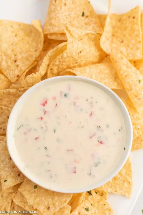 Best Mexican White Cheese Dip. Authentic queso dip that tastes like Mexican Restaurants white sauce recipe. Your entire family is going to love this authentic queso blanco recipe. This is one of my favorite cheese dip recipes. #eatingonadime #mexicanrecipes #diprecipes #cheesediprecipes #quesorecipes White Mexican Cheese Dip, Authentic Queso Dip, Authentic Queso, Mexican Cheese Dip Recipes, Mexican Cheese Dip, White Cheese Dip Recipe, White Queso Recipe, Mexican White Cheese Dip, Mexican White Cheese