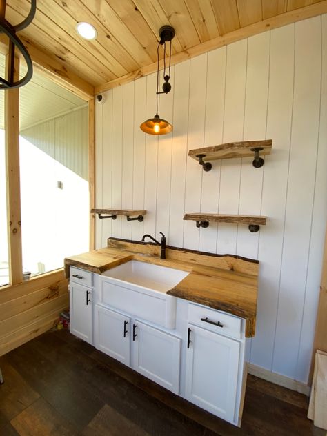 Pine Cabinets White Countertops, White Cabinets In Cabin, Live Edge Shelves Kitchen, Whitewash Wood Walls Knotty Pine, White Wash Butcher Block Countertops Birch, Log House Bathroom, Cabin Kitchen Cabinets, Small Cabin Kitchens, Live Edge Countertop