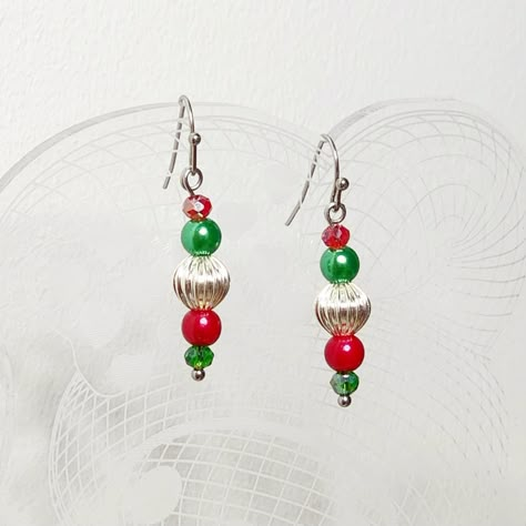 Christmas Dangle Earrings Handmade By Me Red & Green Faux Pearls 6mm Red & Green Briolette Crystal Beads 4mm Silver Pumpkin Beads 8mm Stainless Steel Earring Hooks 1.5" Drop New Beaded Christmas Earrings, Christmas Earrings Handmade, Christmas Jewelry Diy, Pumpkin Beads, Silver Pumpkins, Pumpkin Bead, 2024 Christmas, Earring Ideas, Pearl Crystal