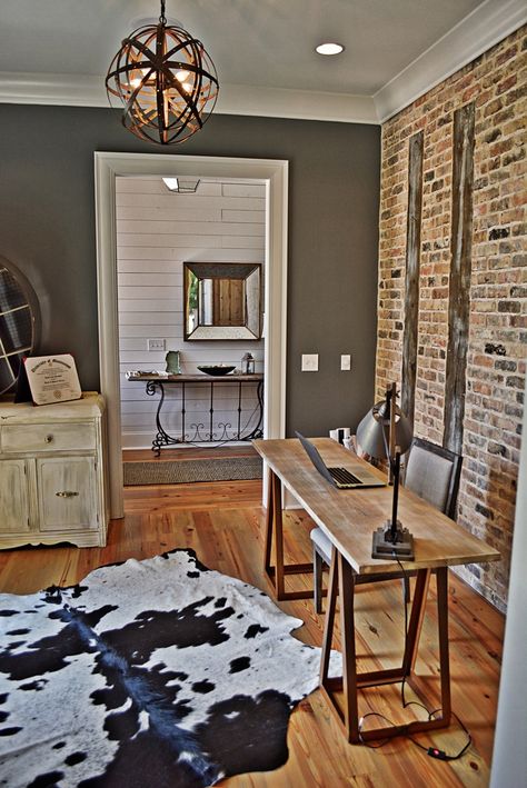 Office with exposed brick wall | Iron Point Homes                                                                                                                                                      More Industrial Flat, Brick Wall Living Room, Stone Walls Interior, Brick Interior Wall, Stairs In Living Room, Investment Company, Salon Suites, Desk In Living Room, Bedroom Wall Hangings