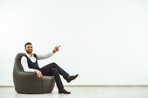 Man Sitting On Chair, Sitting Bag, Space Photoshoot, Marketing Jokes, Happy Businessman, White Wall Background, Businessman Office, Chair Pose, Office Man