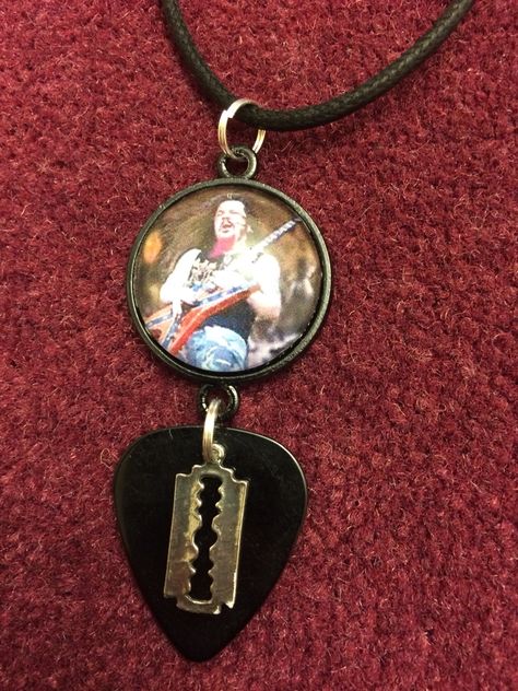 Dimebag Darrell necklace with guitar pick & razor blade charm on leather chord Dimebag Darrell, S Tattoo, Guitar Pick, Sake, My Jewellery, Guitar, Pendant Necklace, Tattoos, Pendant