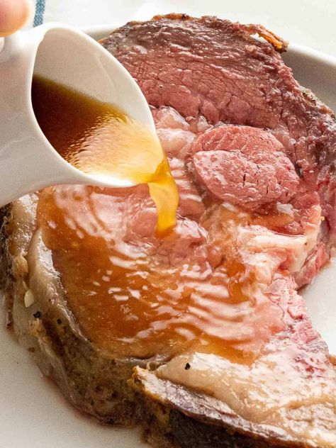 This easy au jus sauce is perfect for prime rib, roast beef, and French dip. It's a simple, flavorful sauce that can be made with or without drippings! All you need are basic ingredients like beef broth, butter, and Worcestershire sauce for a light sauce or gravy that pairs perfectly with any beef recipe. Prime Rib Au Jus Recipe, Roast Beef French Dip, Cooking Prime Rib Roast, Prime Rib Sauce, Jus Sauce, Prime Rib Au Jus, Easy Brown Gravy, Jus Recipe, Au Jus Recipe