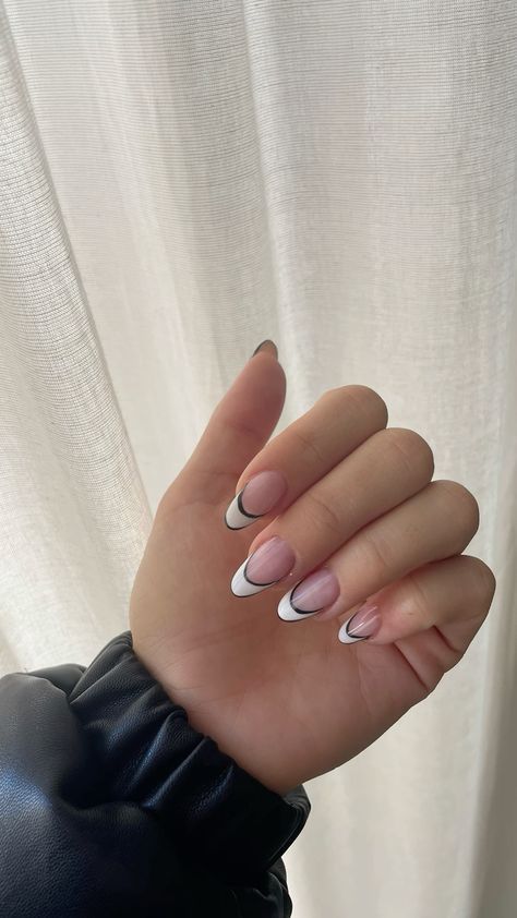 French Tip With Feature Nail, White Tips With Black Design Nails, White French Tip With Black Outline, White Nails With Black Outline, White Tip With Black Line, White French Tip With Line Under, White French Tip Nails With Black Line, French Manicure With Black Line, White Black French Tip Nails