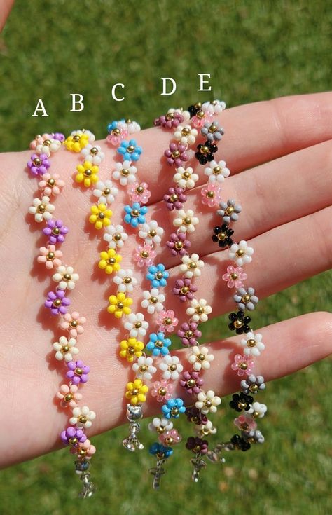 This Beaded Bracelets item is sold by BuganvilleaMarket. Ships from Vacaville, CA. Listed on Sep 16, 2024 Stainless Bracelet, Daisy Jewelry, Daisy Bracelet, Jewelry Knots, Bracelet Bead, Floral Bracelet, Themed Jewelry, Flower Bracelet, Jewelry Inspo