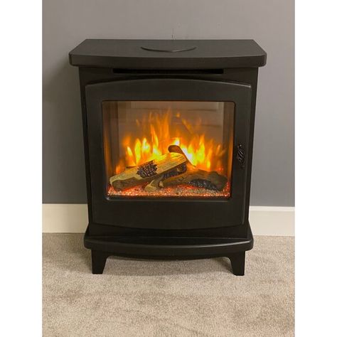 A traditional style free-standing electric fire with a large viewing window and arched door. Electric Log Burner, Black Stove, Electric Logs, Wall Fireplace, Fireplace Suites, Log Store, Electric Fire, Diy Plumbing, Electric Fires