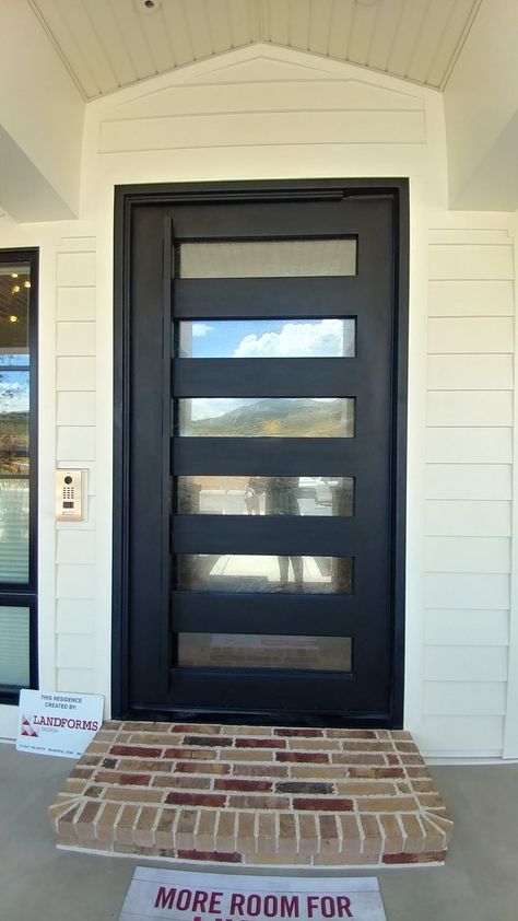 Modern Metal front door Metal Front Door Ideas, Pivot Doors Entry, Metal Doors Exterior, Wooden Garage Doors, Front Door Decal, Door Makeover Diy, Metal Front Door, Steel Front Door, Metal Doors Design