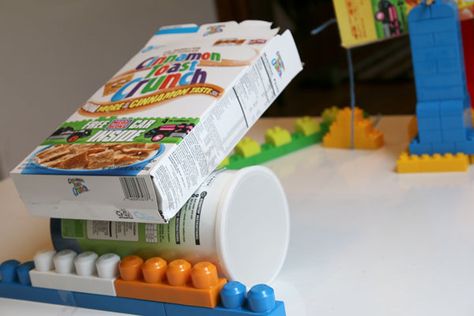 Balancing in a Rube Goldberg Machine Simple Machines Unit, Goldberg Machine, Rube Goldberg, Rube Goldberg Machine, Easy Toddler Crafts, Bowl Of Cereal, Cinnamon Toast Crunch, Easy Toddler, Fair Projects