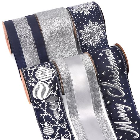 PRICES MAY VARY. 【SIZE】2-1/2 inch wide ribbon,6 yards per spool,6 rolls per package.Come with spool convenient for you to use and store. 【6 Rolls】Christmas-themed navy and silver assortment.High-quality navy satin with glitter silver snowflakes, Merry Christmas pattern, 6 style glitter wired ribbon to meet your various creative Christmas decorations. 【RANG OF USE】Sparkling surface and wired edges make these ribbon perfect for Christmas tree decoration,Christmas toppers bows,wreaths,swags.garland Navy And Silver Christmas Decor, Navy And Silver Christmas, Bow Wreaths, Bows Wreaths, Christmas Toppers, Garland Home Decor, Silver Garland, Christmas Tree Ribbon, Christmas Wired Ribbon