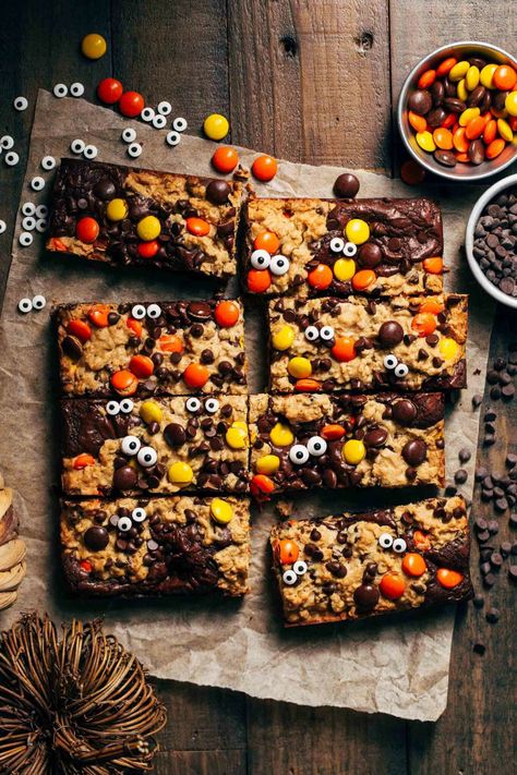 These monster brookies are a delicious combination of soft monster cookie dough and fudgy brownie batter. Add candy eyes for a spooky halloween treat! #brookies #monstercookie #butternutbakery | butternutbakeryblog.com Soft Monster Cookies, Monster Cookie Dough, Butternut Bakery, Best Gingerbread Cookies, Candy Bar Cookies, Monster Cookie Bars, Candy Eyes, Reese's Pieces, Monster Cookie