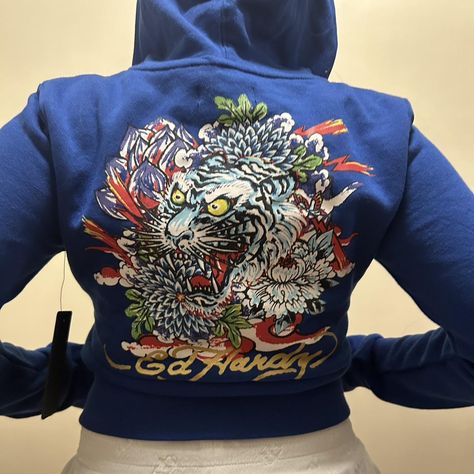 Blue Ed Hardy Hoodie
      
Size: S  
         ... - Depop Ed Hardy Hoodie, So Grateful, Ed Hardy, Hoodie Top, Skirt Leather, Sweatshirt Shirt, Jean Shirts, Casual Skirts, Sneaker Boots