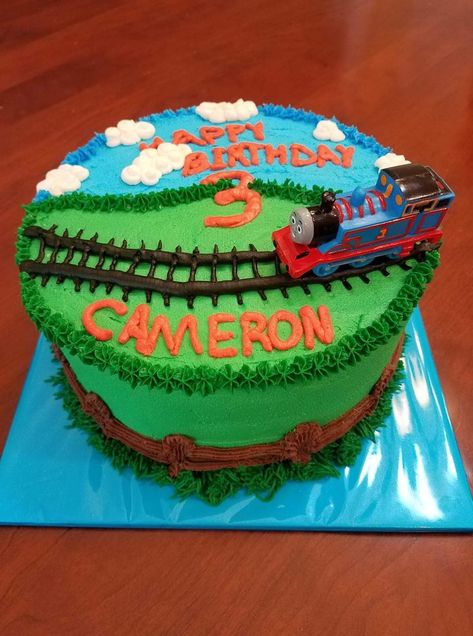 Thomas the tank engine 3 year birthday cake.  Vanilla and chocolate buttercreams 3 Year Birthday Cake, Thomas Train Birthday Cake, Thomas Birthday Cakes, Thomas The Tank Engine Cake, Birthday Cake Vanilla, Thomas The Train Cake, Thomas Train Birthday, Thomas Train Cake, Thomas Cakes