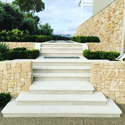 @paulbangay designed statement steps built from reconstituted WA limestone supplied by @limestoneaustralia. Stonework by @rockhardstonework #formedlandscapes #landscaping #morningtonpeninsula #limestone #paving #paulbangay Limestone House Exterior, Limestone Exterior, Cream Limestone, Limestone Cladding, Cladding Exterior, Limestone House, Limestone Block, Stone Wall Cladding, Limestone Wall