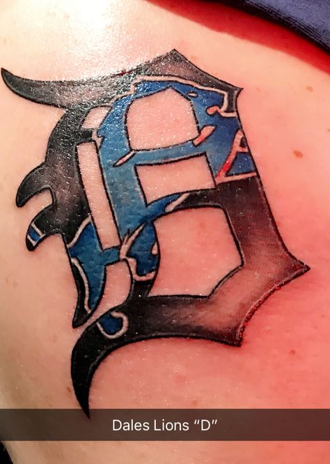 Detroit tattoo with Lions logo inside Detroit Sports Tattoo, Detroit Lions Nails Ideas, Detroit Lions Tattoo Ideas, Detroit Lions Tattoo, Detroit Tattoo Ideas, Lions Tattoo, Detroit Tattoo, Old English D, Sport Tattoos