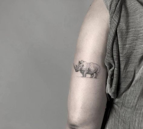 Sketch work rhino tattoo on the tricep. Rhinosaurus Tattoo, Rhino Tattoo Design, Tattoo Rhino, Rhino Tattoo Ideas, Rhino Tattoos, Rhinoceros Tattoo, Rhino Tattoo, African Rhino, Sloth Tattoo