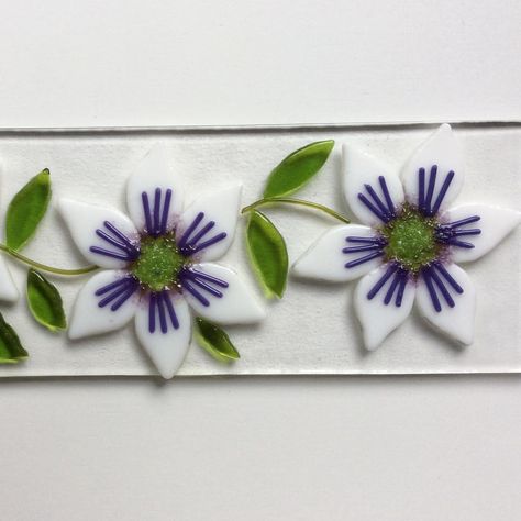 Jewel Glass Fused Glass on Instagram: “Clematis flowers after a visit to the kiln #fusedglass #fusedglassflowers #fusedglassart #clematis #Bullseyeglass #mywarmglass…” Layered Glass Art, Tiffany Glass Art, Fused Glass Dishes, Glass Art Design, Art Glass Jewelry, Clematis Flower, Glass Art Pictures, Glass Suncatchers, Glass Fusion Ideas