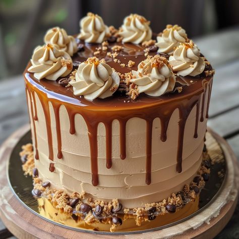 ☕ Indulge in the luxurious flavors of Caramel Coffee Buttercream Cake! A true delight for coffee lovers! 🍰 🍴 Irresistible Caramel Coffee Buttercream Cake 🛒 Ingredients: Cake flour: 2 cups Sugar: 1 cup Baking powder: 1 tsp Eggs: 3 Coffee (strong brewed): 1 cup Butter: 200g Caramel sauce: 1/2 cup 👩‍🍳 Instructions: Bake Cake: Mix flour, sugar, baking powder, eggs, and coffee. Bake at 350°F for 30 minutes. Buttercream: Whip butter, gradually add caramel and coffee. Assemble: Frost cake with b... Caramel Cake Design, Coffee Caramel Cake, Chocolate And Caramel Cake, Frost Cake, Cupcake Recipes Uk, Surah Mulk, Chocolate Caramel Cake, Caramel Delights, Coffee Buttercream