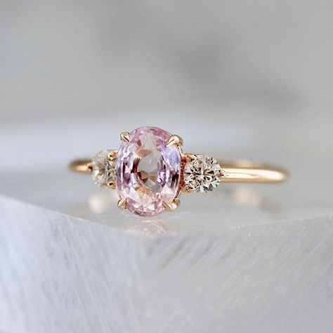 3 Stone Pink Sapphire Ring, Pink Gem Stone Engagement Rings, Pink Diamond Gold Engagement Ring, Gold Wedding Ring With Pink Stone, Engagement Ring With Pink Stone, Pink Diamond Engagement Ring Gold, Oval Pink Sapphire Engagement Ring, Engagement Rings With Pink Diamonds, Pale Pink Engagement Ring