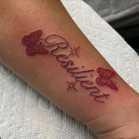 Resilient Tattoo Ideas, Small Red Tattoo Ideas, Dope Tattoos For Women Arm, Chucky Tattoos, Resilient Tattoo, Tattoo Ideas Words, Resilience Tattoo, Tattooing Inks, Chucky Tattoo