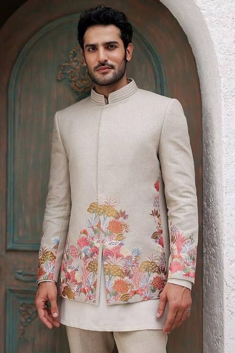 Check out these stunning and fresh tropical-themed outfits for grooms, from pastel bandhgalas to unique floral kurtas. Perfect for your exotic wedding!