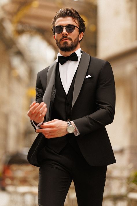 Step into enduring charm with our Black Slim-Fit Tuxedo 3-Piece attire. The single-breasted blazer, boasting a polished 1-button closure and shawl lapels, captures attention with its timeless appeal. #blackoutfit #blacktuxedo #tuxedo #formalattire #formalwear #mensfashion #suitup #tailored #specialoccasion #sophisticatedstyle #polishedlook #dapper #suit #mensstyle #fashion #gentleman Wedding Suits Men Black, Blazer Waistcoat, Black Tie Tuxedo, Suit Styles, Double Breasted Tuxedo, Suit Stores, Slim Fit Suit Men, Ring Ceremony, Cover Album