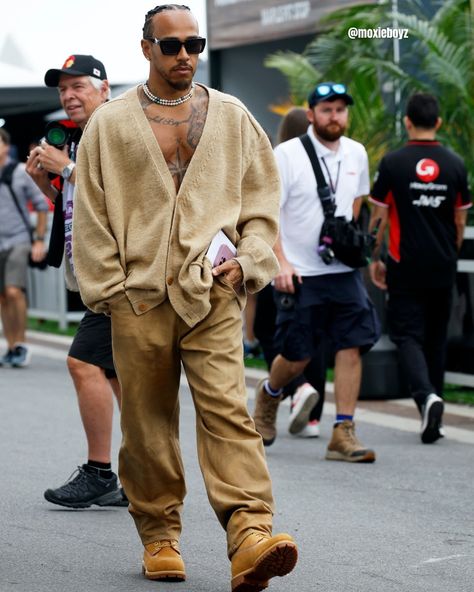 Cool, calm, and collected at the Canadian Grand Prix 🏁 Lewis Hamilton stuns in a sleek Magliano FW24 cardigan and loose-fit pants, paired with 3.PARADIS sunglasses and POLITE WORLDWIDE pearl necklaces. #LewisHamilton #CanadianGP #MaglianoFW24 #3PARADIS #StyleIcon . . . . . . . . . . . . . .. . .. Content Ownership Disclaimer We appreciate the hard work of creators. If you own any content in our posts and have concerns, please DM us. We're here to address any issues promptly, whether it's rem... Dude Outfits, Hamilton Fashion, Cool Calm And Collected, Big And Tall Style, Canadian Grand Prix, Fly Guy, Tall Fashion, Mens Trendy Outfits, Pearl Necklaces