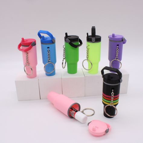 Calling all Stanley fans! Never misplace your chapstick again with our mini Stanley IceFlow Flip Straw Tumbler chapstick holder keychains! Fits most chapsticks.  Available in 24 colors! Choose your top/handle color and you cup color to customize your keychain! Keychains are 3.50" tall and fit a full size standard Chapstick and EOS Tubes.  Choose from the following colors: Bubblegum Pink Hot pink Light pink Rose gold Tan White Black Dark green Light green Aqua Light blue Blue Purple Shiny orange Customized Stanley Tumbler, Neon Stanley Cup, Chapstick Tumbler, Mini Stanley, Stanley Flip Straw Tumbler, Stanley Cup Flip Straw, Cool Keychains Claire's, Hippie Rug, Stanley Products