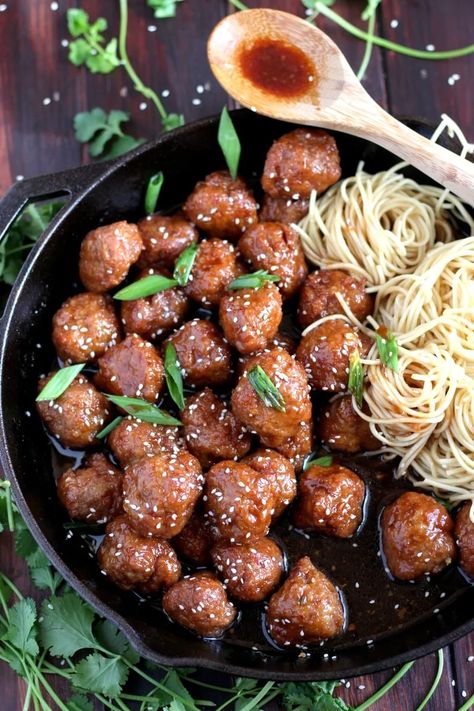 Sesame Soy Ginger Meatballs + Noodles. Easy to make meatball recipe, baked in a soy ginger sauce. thewoodenskillet.com Meatballs Noodles, Ginger Meatballs, Soy Ginger Sauce, Recipe For A Crowd, Soy Ginger, Ginger Pork, Appetizer Meatballs, Chow Mein Noodles, Pork Meatballs