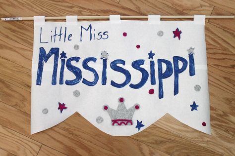 How to Make a Parade Banner How To Make A Banner Diy, Parade Banner Ideas, Girl Scout Daisy Petals, Parade Banner, Rosie Riveter, Homecoming Floats, Christmas Parade Floats, Parade Ideas, Homecoming Parade