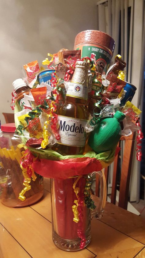 Michelada Mouquet Numero Tres... this time with Modelo and lime :) Michelada Gift Basket Ideas, Modelo Gift Idea, Modelo Bouquet For Him, Fathers Day Beer Bouquet, Gifts For Mexican Dads, Fathers Day Gifts Ideas Mexican, Valentines Gifts For Coworkers, Diy Father's Day Gift Baskets, Birthday Baskets