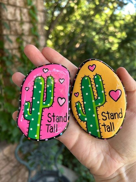 Rock Garden Painted Rocks, Pink Painted Rocks Ideas, Inspirational Painted Rocks Ideas, Pink Painted Rocks, Spring Painted Rocks Ideas, Cactus Rocks Painted, Rock Painting Cactus, Spring Painted Rocks, Inspirational Rock Painting Ideas