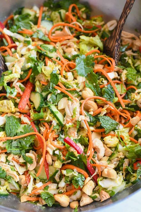 Vietnamese Chicken Salad with Fresh Herbs is made with chicken, slaw like vegetables, mint, cilantro and a traditional homemade Vietnamese dressing. It's a flavor extravaganza. The fresh and bright flavors and magical balance of sour, sweet, salty, umami and bitter flavors create a chicken salad that's super yummy and nutritious. Satay Chicken Salad, Rainbow Colored Vietnamese Chicken Salad, Rainbow Vietnamese Chicken Salad, Vietnamese Chicken Salad With Sweet Lime Garlic Dressing, Vietnamese Chicken Salad With Sweet Lime, Milk Street Vietnamese Chicken Salad, Vietnamese Chicken Salad With Sweet Lime-garlic Dressing (goi Gà), Vietnamese Chicken Salad Milk Street, Vietnamese Salad Recipes