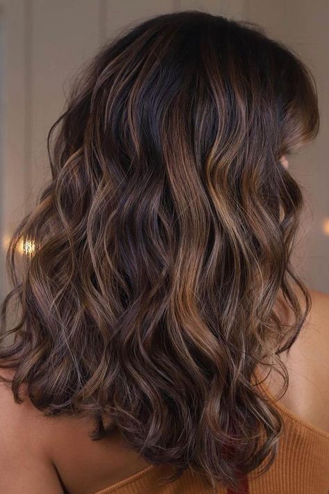 Dark Brown Mid Length Curly Hair, Dark Brown Hair Wavy Curls, Deep Caramel Highlights, Honey Bayalage Brunette Curly, Balayage Hair Brunette Curly Natural, Highlight For Dark Brown Curly Hair, Lowlights For Brown Hair Curly, Brunette Lowlights Curly Hair, Dark Curly Hair With Balayage