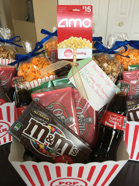 Movie date night basket Movie Night Auction Basket, Couples Movie Night Gift Basket, Date Night Silent Auction Basket, Movie Date Gift Basket, Dinner And Movie Gift Basket, Date Night Basket, Chocolate Santa, Fruit Crafts, Edible Crafts