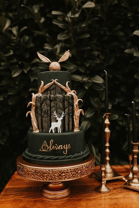 Floating candles, cloaks, & a patronus cake at this mystical Harry Potter-inspired wedding inspiration | Offbeat Bride Tort Harry Potter, Gateau Harry Potter, Cumpleaños Harry Potter, Harry Potter Birthday Cake, Harry Potter Wedding Theme, Harry Potter Food, Festa Harry Potter, Anniversaire Harry Potter, Buku Harry Potter