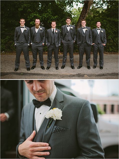 Gray suits with black bow ties for one dapper groomsman look Black And Gray Groomsmen Attire, Black Tux With Grey Groomsmen, Groom In Grey Groomsmen In Black, Black Groom Suit Gray Groomsmen, Black Bridesmaids Gray Groomsmen, Groomsmen Looks, Beach Wedding Attire, Mens Fashion Wedding, Groom And Groomsmen Attire