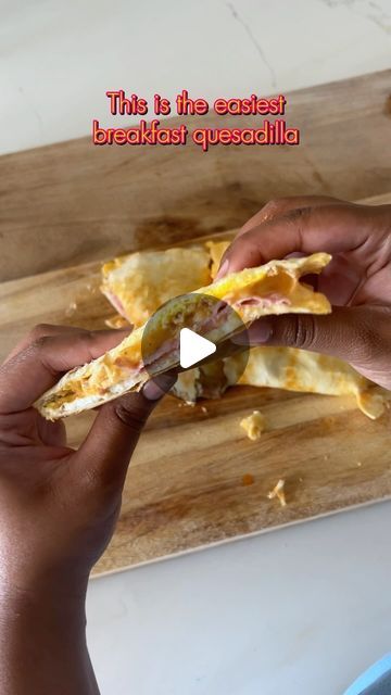 Brittnee on Instagram: "This hack makes the easiest breakfast quesadilla you’ll ever make!  I used low carb tortillas filled with eggs, cheddar, bacon, ham and American cheese but you can use any of your favorite fillings.  Add your tortilla to a lightly oiled skillet, crack your eggs, cover and cook for 3-4 minutes.  Stuff it with whatever you want, cover and cook for another 2-3 minutes and you’re done!   #breakfastquesadilla #breakfasthack #easybreakfast #easyrecipes #lowcarbbreakfast" Low Carb Tortilla Breakfast Ideas, Breakfast Quesadilla Healthy, Easiest Breakfast, Egg Tortilla, Breakfast Tortilla, Breakfast Hack, Breakfast Quesadilla, Ham And Eggs, Low Carb Tortillas