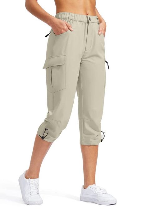 PRICES MAY VARY. Lightweight & Quick Dry Fabric: The womens capri pants crafted of lightweight, quick dry, breathable fabric dries sweat quickly to keep you cool and fresh all day in hot summer days. 5 Deep Pockets: 2 side pockets, 1 right thigh cargo pocket, 1 left thigh zipper pocket and 1 back zipper pockets are all deep enough to store your phones, keys or cards, free your hands during hiking or travel. UPF50+ & Water Resistant: UPF 50+ fabric provides maximum protection against the sunburn Cargo Capris, Hiking Pants Women, Womens Capri Pants, Women Travel, Hiking Pants, Cargo Pocket, Hiking Women, Dark Khaki, Green Camo