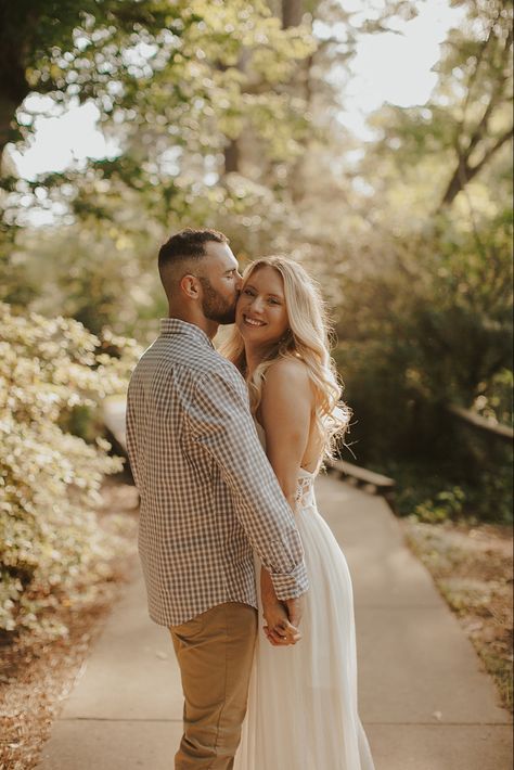 White dress engagement photo White Tee And Jeans Engagement Photos, Modest Engagement Photos, White Dress Engagement Pictures, White Dress Engagement Photos, Engagement Photos White Dress, White Dress Engagement, Engagement Shoot Outfit, Dress Engagement, Couple Picture