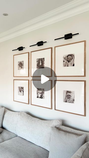 Nikki Jackson  🤍 on Instagram: "I still get so many DMs/comments about our little gallery wall so I thought I would repost and tag where all is from again 🤗  • Battery wall lights - @online_lighting * Although they look black, mine are the bronze large size  • Frames - 50x50 @hmhome   • Inserts - @ebay_uk   All links, details and sizes on my “new links” highlight ❤️  *previously gifted  #gallerywall #batterywalllights #walllights #picturelights" Photo Wall Lighting Ideas, Gallery Wall With Picture Lights, Pictures With Lights On Wall, Gallery Wall With Lights, Wall Behind Sofa, Battery Wall Lights, Hallway Wall Lights, Light Picture Wall, Above Couch