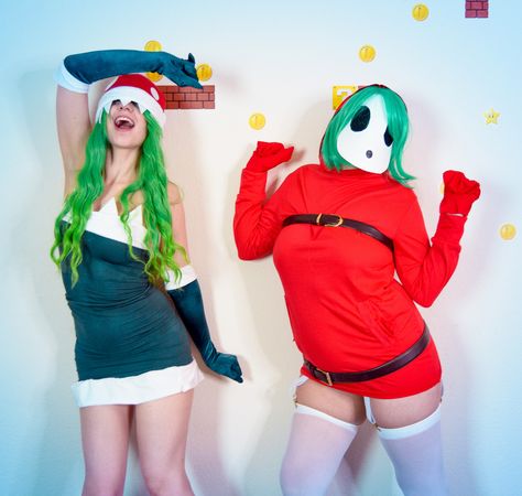 Piranha Plant and Shy Guy monsters / Mario Bros cosplay by Fae D'Cay and Muffy Swiftpath . . #mario #villain #couple #cosplay #mariobros #piranhaplant #shyguy #nerd #costumeideas #costume #geek #monster #girls #halloween #friend Shy Guy Cosplay Female, Mario Cart Cosplay, Peach And Bowser Cosplay, Pirhana Plant Costume Mario, Pirhana Plant Mario, Mario Cosplay, Shy Guy, Mario Bros, Cosplay Costumes