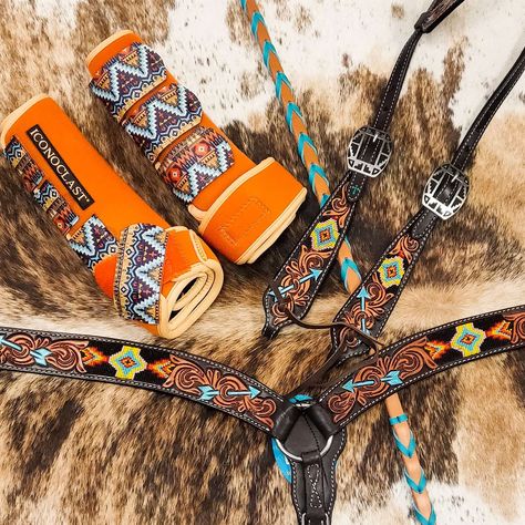 Brightly colored turquoise arrows shoot across gorgeous tooled flourishes set off by a black leather background. Brightly colored beaded inlays add a colorful pop to this fun, dynamic tack set. Note - The tack sets include one headstall and one breast collar. You must select tack set in the drop down to order both pieces. Otherwise you are ordering individual items. The boots and reins are shown for demonstration only and are not included in a tack set purchase. They may be purchased separately. Barrel Tack Sets, Tackroom Ideas, Black Leather Background, Western Riding Tack, Bling Tack Sets, Western Tack Sets, Beaded Cactus, Barrel Racing Tack Sets, Barrel Racing Tack Rodeo