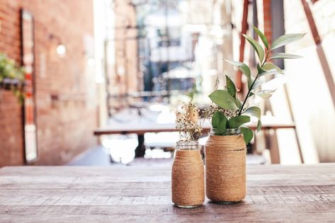 Plants in Glass Jars · Free Stock Photo Plants In Glass Jars, Table Centrepiece Ideas, Cafe Plants, Mini Succulent Garden, Centrepiece Ideas, Plant In Glass, Table Centerpiece Ideas, Easy Table, Sustainable Decor