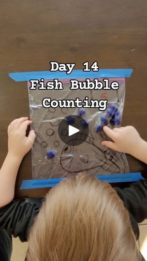 6.4K views · 2.9K reactions | Fish Bubble Counting 🫧 

Day 14 of 29 of simple daily activities. 

Today's is an easy sensory bag that is great for kids learning to count and number recognition. Using permanent markers, draw your fish and bubbles. Pour in some water and pompoms, squeeze the extra air out, and seal. 
Tape down the bag and allow free play or write numbers in dry erase markers and fill the correct number of bubbles! 

--------

#kidsactivities #easykidactivity #learningactivitiesforkids #countingactivity #sensorybag #canadianmom #sahm #kidsactivityideas | 🅺🅰🆁🅸 | Abby Posner · Paint Me Happy Number Learning, Count Days, Learning Crafts, Easy Kid Activities, Learning To Count, Fish Activities, Sensory Bag, Learn To Count, Counting Activities