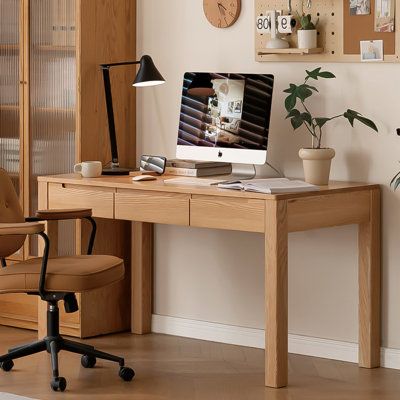 Experience the essence of nature with our sleekly desk. Crafted from select oak, it embodies durability and elegance. With its smooth texture and rich color, this desk is not just a workspace, but a statement piece that elevates any room. Enjoy the comfort of its rounded edges and the security of its solid build. Organize your essentials in the smooth-sliding drawers, and let your creativity flow freely on its spacious surface. Easy to assemble, this desk is the perfect addition to your home off