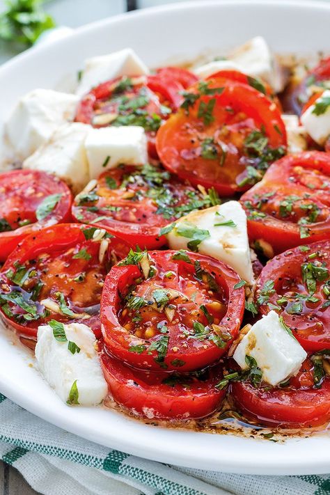 Marinated Tomatoes – A perfect hors d’oeuvre full of fresh summer flavors! Tomatoes With Mozzarella, Tomatoes And Mozzarella, Tomatoes Mozzarella, Summer Flavors, Marinated Tomatoes, Vegetarian Pasta, Fresh Summer, Recipes Vegetarian, Tomato Recipes