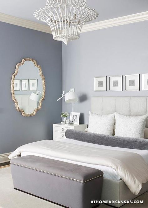 At Home in Arkansas - bedrooms - Gray room, tufted headboard, gray upholstered bench, white chandelier, gold mirror, white nightstand,  Melissa Glam Bedrooms, Blue Gray Bedroom, Bedroom Transitional, Made Bed, Grey Accent Wall, Transitional Bedroom, Bedroom Remodel, Eclectic Bedroom, Grey Room